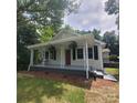 Inviting exterior of a well-maintained home with a spacious front porch at 4421 Linwood Rd, Gastonia, NC 28052