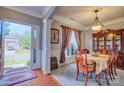Elegant dining room with hardwood floors, chandelier, and classic furniture at 511 Rough Hewn Ln, Rock Hill, SC 29730