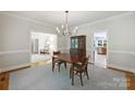 Formal dining room featuring neutral paint, ample space, and views to other living areas at 7117 Cobblecreek Dr, Weddington, NC 28104