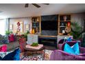 Comfortable living room with stylish decor, built-in shelving, and fireplace at 12150 Plover Dr, Charlotte, NC 28269
