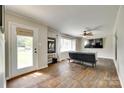 Cozy living room with hardwood floors, neutral walls, and ample natural light at 739 Springdale Rd, Rock Hill, SC 29730