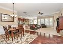Open-concept living space with dining area, a modern kitchen, and a cozy living room at 1397 Tupelo Rd, Clover, SC 29710
