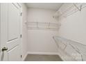 Walk-in closet with carpeted floor and wire shelving for ample storage at 908 Smithcliffs Trl, York, SC 29745
