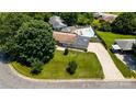 An aerial view of the home showing the yard, driveway, and neighborhood at 920 Thomas St, Statesville, NC 28677