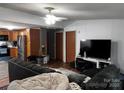 Spacious living room open to the kitchen, featuring updated flooring at 226 Lake Sylvia Rd, Lincolnton, NC 28092