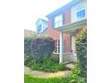 Two-story home with brick and vinyl exterior and covered porch at 3509 Joel Turner Dr, Charlotte, NC 28216