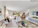 Bright, open living space with hardwood floors and comfortable seating at 527 Millstone Dr, Edgemoor, SC 29712