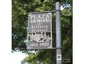 Historical Plaza Midwood neighborhood sign circa 1903, features unique architecture and lush landscaping at 1126 Clement Ave, Charlotte, NC 28205