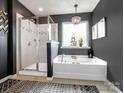 Elegant bathroom with a standalone tub and a separate glass-enclosed shower at 417 Livingston Dr, Lancaster, SC 29720