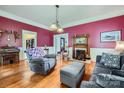 Spacious living room featuring beautiful hardwood floors and fireplace at 200 W 14Th St, Salisbury, NC 28144