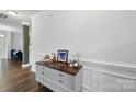 Hallway features hardwood floors and stylish decorations at 2034 Houle Ln, Charlotte, NC 28214