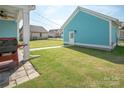 Expansive backyard, ideal for outdoor activities, featuring well-maintained lawn and cozy string lights at 282 Auburn View Rd, Rock Hill, SC 29730