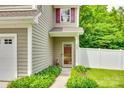 Inviting front entrance with manicured landscaping leading to a warm-toned door on a well-maintained home exterior at 288 Sand Paver Way # 50, Fort Mill, SC 29708