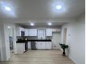 Well-appointed kitchen with stainless steel appliances, sleek countertops, and modern cabinetry at 39 E White St, Chester, SC 29706