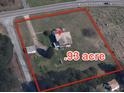 Aerial view showing the property is .93 acres and shows proximity to surrounding neighborhood and landscape at 6229 Mountain Grove Rd, Hickory, NC 28602