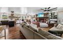 Inviting living room with fireplace, wood floors, and an open layout for seamless entertaining at 110 Heritage Dr, Kings Mountain, NC 28086