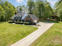 Beautiful single-Gathering home with attached garage and lush green surroundings at 127 Fantasy Ln, Mooresville, NC 28117