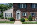Close-up of a brick home with well-maintained landscaping at 1330 5Th Ne St # 11, Hickory, NC 28601
