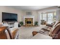 Comfortable living room featuring a stone fireplace and an open layout at 1330 5Th Ne St # 11, Hickory, NC 28601