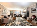 Inviting living room featuring a decorative fireplace, plush seating, and a stylish area rug at 2024 5Th Street Nw Pl, Hickory, NC 28601