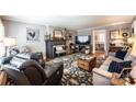 Warm living room showcases a fireplace, comfortable seating, and charming decor at 2024 5Th Street Nw Pl, Hickory, NC 28601