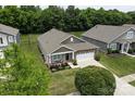 Charming single-Gathering home featuring manicured lawn and welcoming front porch at 7328 Strawberry Fields Ln, Charlotte, NC 28278