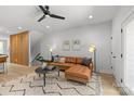 Open living area with ceiling fan, stylish furnishings, and neutral color palette at 1356 Briar Creek Rd, Charlotte, NC 28205