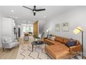 Open-concept living room with modern decor and lots of natural light at 1356 Briar Creek Rd, Charlotte, NC 28205