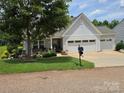 Inviting single-Gathering home with a well-kept lawn and a three-car garage at 16115 Commodore Dr, Lancaster, SC 29720
