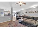 Bright, open-concept living room with hardwood floors and neutral color palette at 210 Clove Hitch Dr, Salisbury, NC 28677