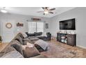 Spacious living room with a large sectional sofa and modern decor at 210 Clove Hitch Dr, Salisbury, NC 28677