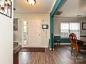 Open foyer with neutral walls, wood flooring, and staircase access for an inviting entry at 2848 Huckleberry Hill Dr, Fort Mill, SC 29715