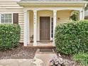 Inviting front entry with brick-lined walkway, charming shrubs, and prominent house number display at 2848 Huckleberry Hill Dr, Fort Mill, SC 29715