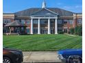 Harrisburg Town Hall is featured with a manicured lawn, stately architecture, and convenient parking at 3944 Town Center Rd, Harrisburg, NC 28075