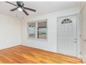 Bright entryway with hardwood floors, a stylish door, and a window overlooking the outside at 140 Fairway Ln, Gastonia, NC 28216