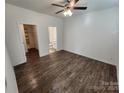 Spacious main bedroom featuring new flooring, walk-in closet, and en-suite bathroom at 10410 Bradstreet Commons Way, Charlotte, NC 28215