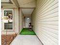 Inviting front porch with decorative planters and a clear view of the entry door at 10951 Fox Mill Ln, Charlotte, NC 28277