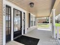 Inviting front porch featuring stylish doors and ample space at 12300 Caldwell Rd, Charlotte, NC 28213