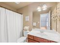 Cozy bathroom featuring a vanity and shower with a curtain at 136 Pink Orchard Dr, Mooresville, NC 28115