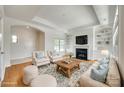 Bright living room with fireplace, built-in shelving, and elegant decor perfect for entertaining at 2261 Lincolnshire Ln, Waxhaw, NC 28173