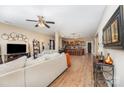 Spacious living room with wood flooring and a seamless open floor plan at 611 Sawtooth Oak Dr, Landis, NC 28088