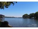 Enjoy the beautiful lake view from this waterfront property at 114 Caraway Ln, Mooresville, NC 28117