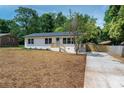 Well-maintained home with a new driveway and landscaping, offering great curb appeal and a move-in ready experience at 756 Logan St, Mooresville, NC 28115