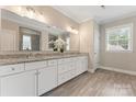 Elegant bathroom featuring double vanity with granite countertop and tiled floor at 4008 Pinot Way, Fort Mill, SC 29707