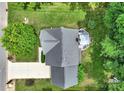 Aerial top-down view highlights roof, deck, landscaping, and driveway of the property at 488 Saint George Rd, Fort Mill, SC 29708
