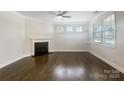 Bright living room features a fireplace, hardwood floors, and lots of natural light at 103 Margo Ln, Statesville, NC 28677
