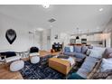 Inviting living room with an open concept, modern furnishings, and seamless flow at 1315 Elizabeth Ave, Kannapolis, NC 28083
