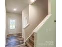 Inviting entryway featuring a staircase and attractive flooring, leading into the home at 414 1St Avenue Se None, Hickory, NC 28602