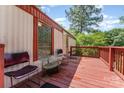 Inviting outdoor deck with seating and a charming ambiance, perfect for relaxation at 5239 Lineberger Rd, Stanley, NC 28164