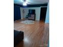 Spacious living room featuring hardwood floors and unique decor at 5570 George Henry Dr, Hickory, NC 28602